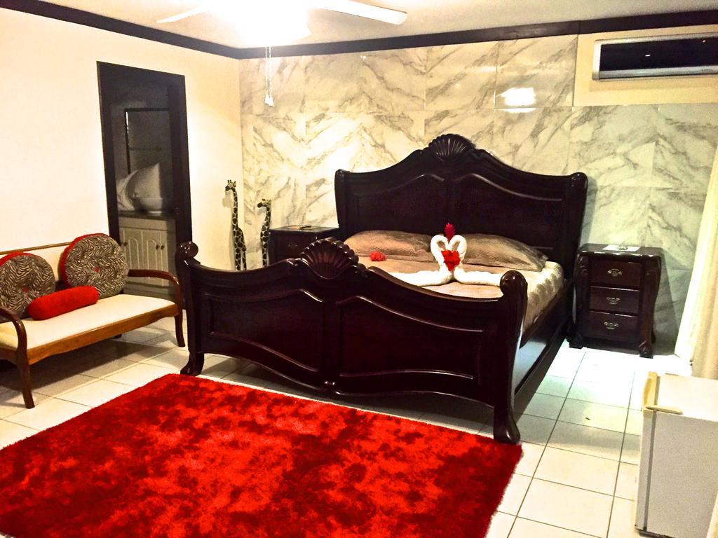 Tuanis Aparthotel Jacó Kamer foto